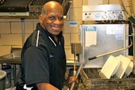 a man working inside a kitchen